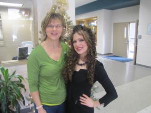 Victoria stands next to Effingham Middle School Counselor, Lynn Bethune 